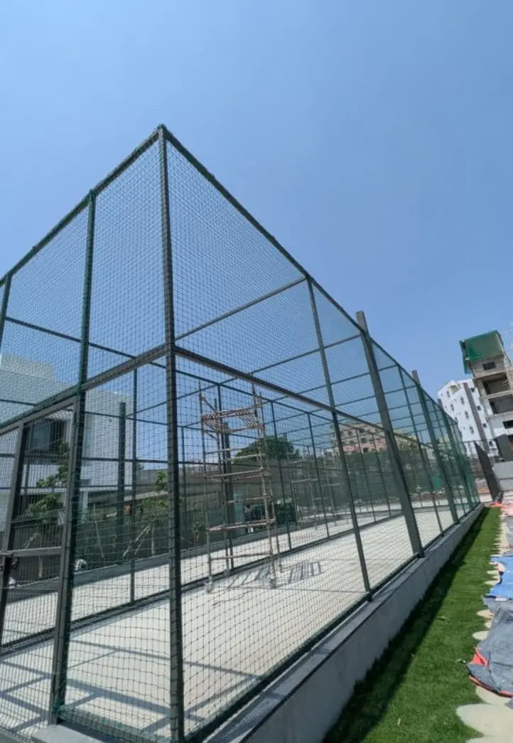 Rooftop cricket practice net enclosure on a steel frame